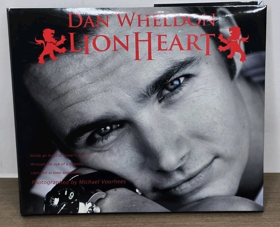 Dan Wheldon LionHeart Book Hard Cover Dust Jacket 120 Pages Indy 500