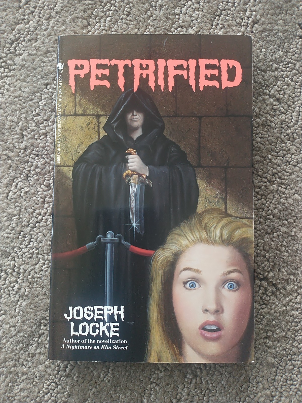 PETRIFIED by Joseph Locke. 1st printing 1992. YA Horror. Like New Condition pb