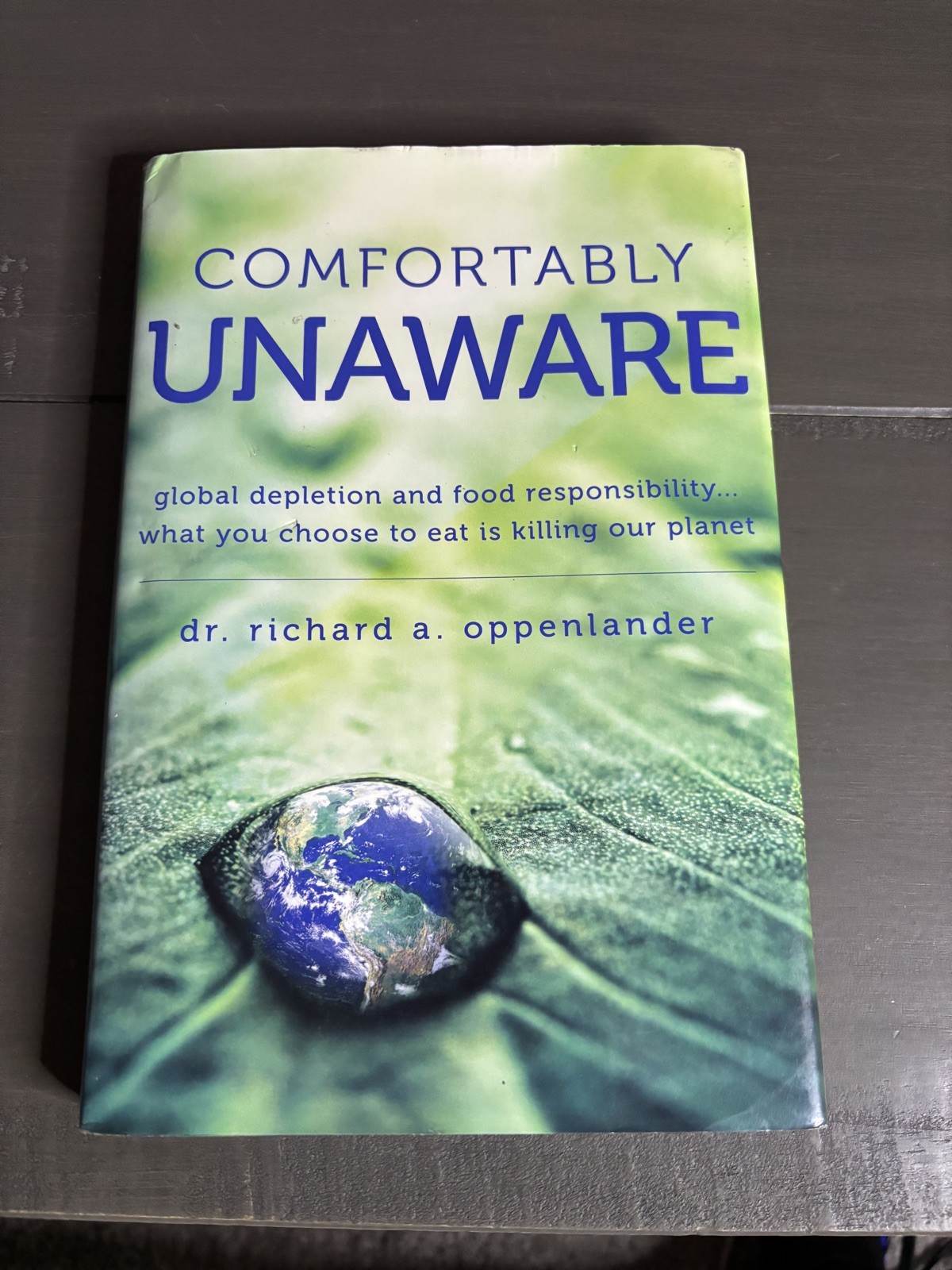 Comfortably Unaware – Dr. Richard A. Oppenlander – Hardcover First Edition 2011