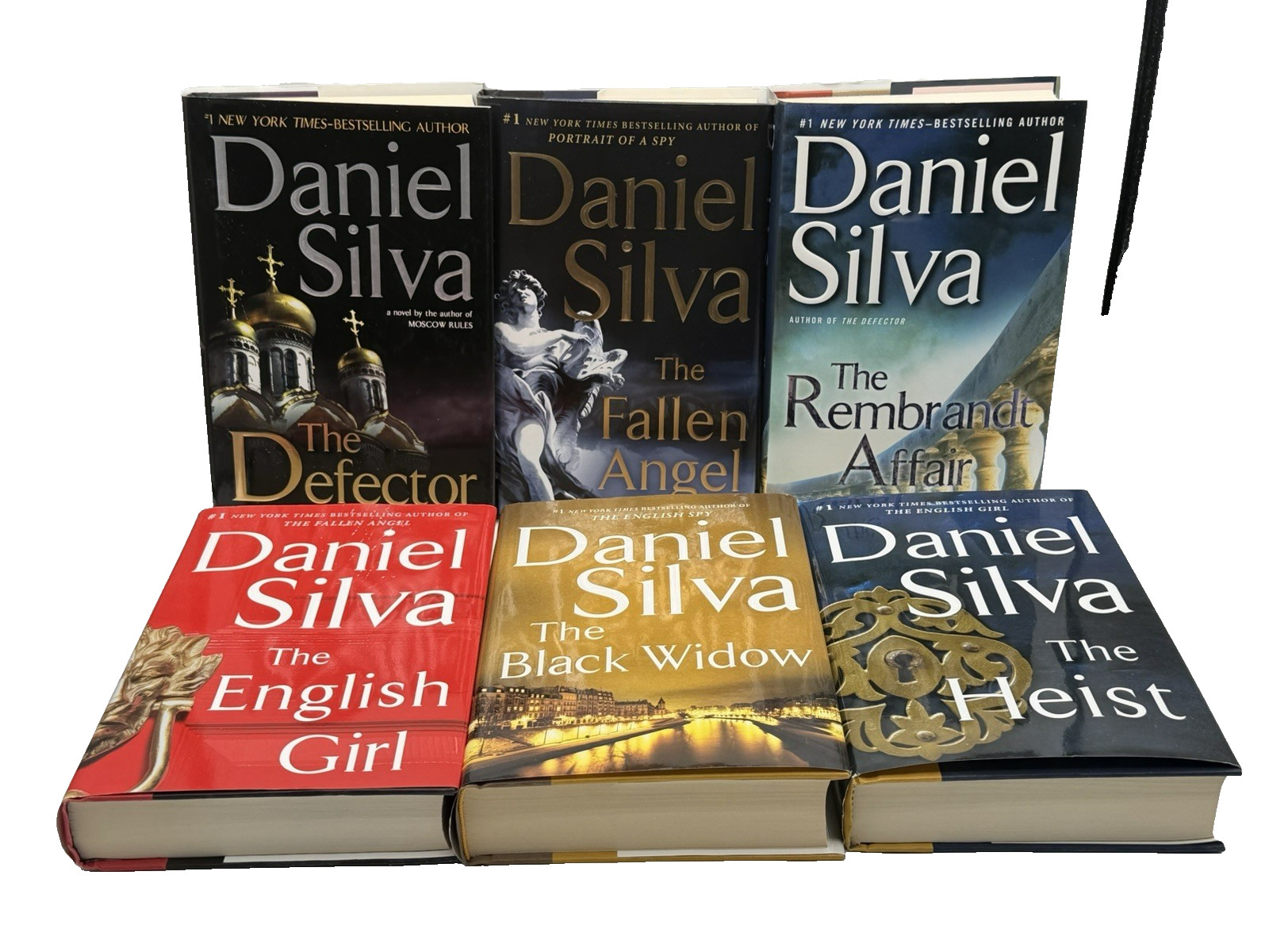 Lot Of 6 Daniel Silva Hardcover Novels Books – Fallen/Heist/English/Black Widow